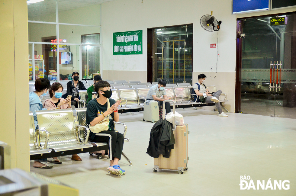 All passengers wearing face masks at the station