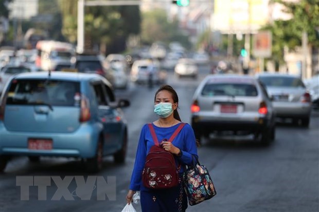 A woman wearing a face mask in Yangon city, Myanmar, on March 13 (Photo: Xinhua/VNA)