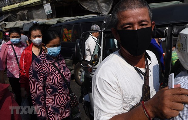 People in Phnom Penh, Cambodia, wear face masks to prevent the spread of Covid-19 (Source: AFP)