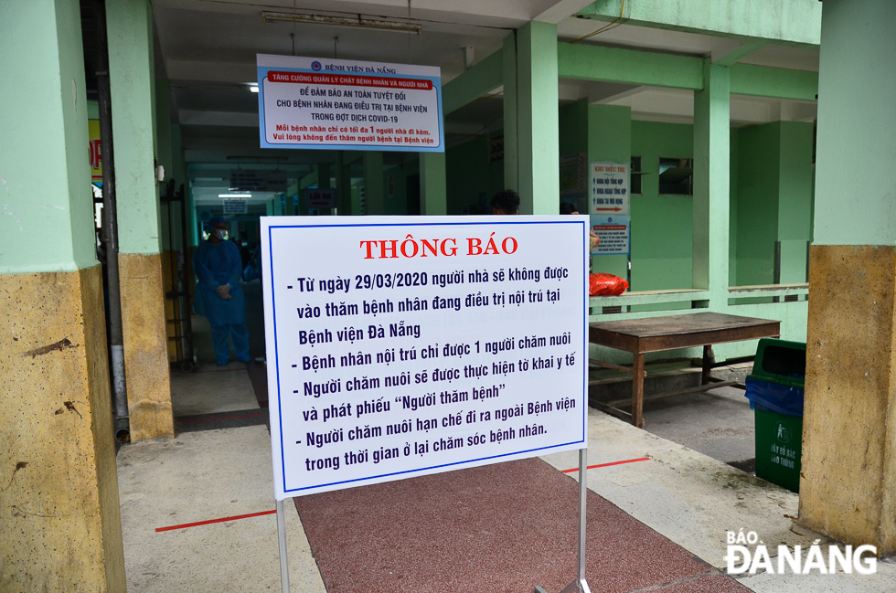 Another notice board placed at the entrance gate to the hospital to announce the ban on visits in order to protect patients and hospital staff from the virus. 