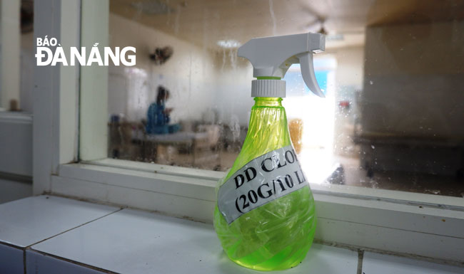 A disinfectant liquid bottle placed in the hospital’s special isolation area