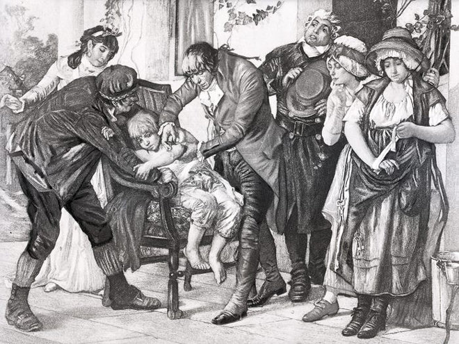 Tranh mô tả bác sĩ người Anh Edward Jenner thực hiện tiêm chủng vaccine bệnh đậu mùa đầu tiên trên người cậu bé James Phipps, 8 tuổi, ngày 14-5-1796. 