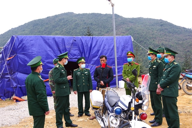 Guards in Ha Giang Province are on duty around the clock at the border between Viet Nam and China to detect possible Covid-19 infections.