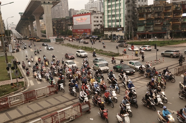 Traffic on Trường Chinh Street in Hà Nội on Tuesday afternoon. Streets in the capital have reportedly become busier in the last few days while Hà Nội is still in the group of localities with high risk of COVID-19 infection with social distancing measures  in place. 