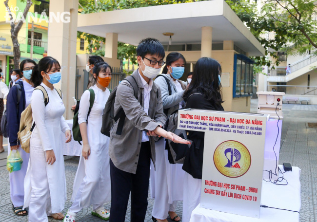 An automatic hand sanitiser dispenser installed at the Tran Phu Senior High School