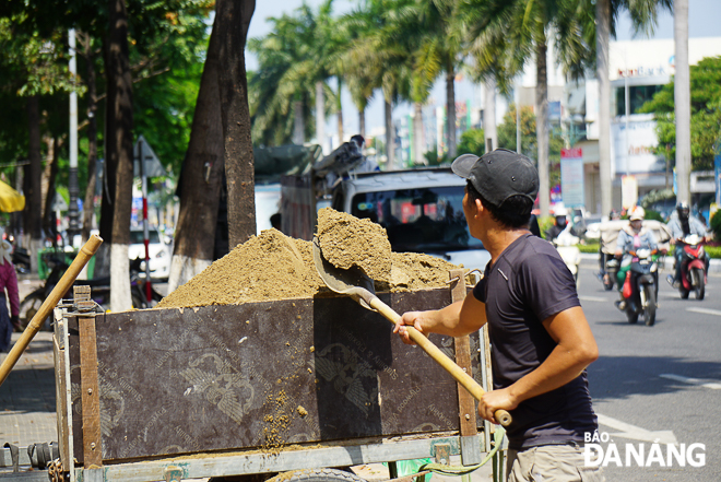 … construction workers still working outside in hot weather 