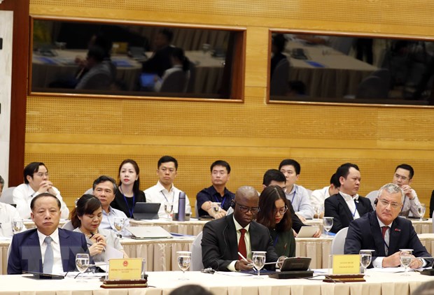 Các đại biểu tham dự hội nghị tại điểm cầu Hà Nội. (Ảnh: Thống Nhất/TTXVN)