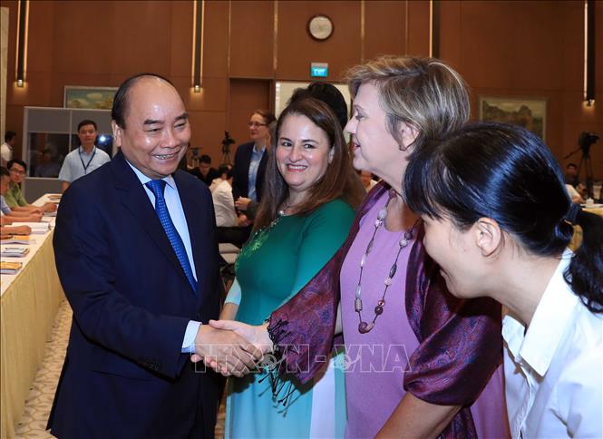 Thủ tướng Nguyễn Xuân Phúc với các đại biểu quốc tế tham dự hội nghị. Ảnh: Thống Nhất/ TTXVN
