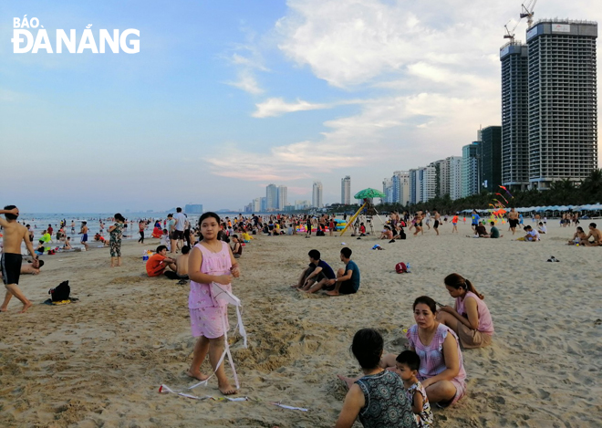 A local beach crowded with beach-goers in the afternoon of 14 May