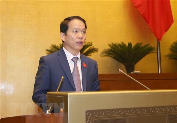 Chủ nhiệm Ủy ban Pháp luật của Quốc hội Hoàng Thanh Tùng trình bày Báo cáo thẩm tra dự án Luật Cư trú (sửa đổi). (Ảnh: Doãn Tấn/TTXVN)