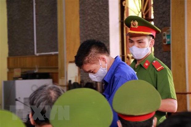 Bị cáo Trần Xuân Yến (nguyên Phó Giám đốc Sở Giáo dục và Đào tạo tỉnh Sơn La) tại phiên tòa. (Ảnh: Hữu Quyết/TTXVN)