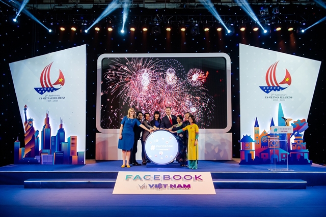 Delegates launch the “Facebook for Vietnam” campaign to celebrate the 25th anniversary of Việt Nam - US relations on May 24.