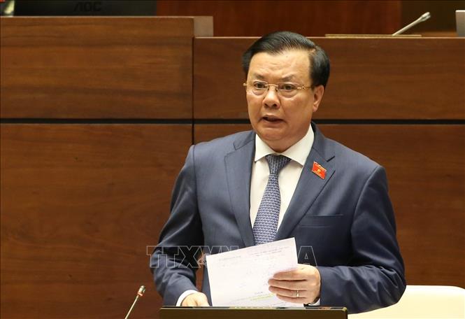  Bộ trưởng Bộ Tài chính Đinh Tiến Dũng giải trình làm rõ những vấn đề đại biểu Quốc hội nêu. Ảnh: Dương Giang/TTXVN