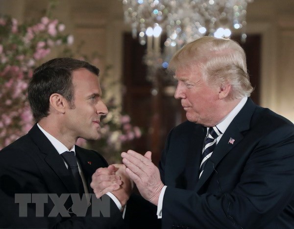 Tổng thống Mỹ Donald Trump và Tổng thống Pháp Emmanuel Macron. (Ảnh: AFP/TTXVN)