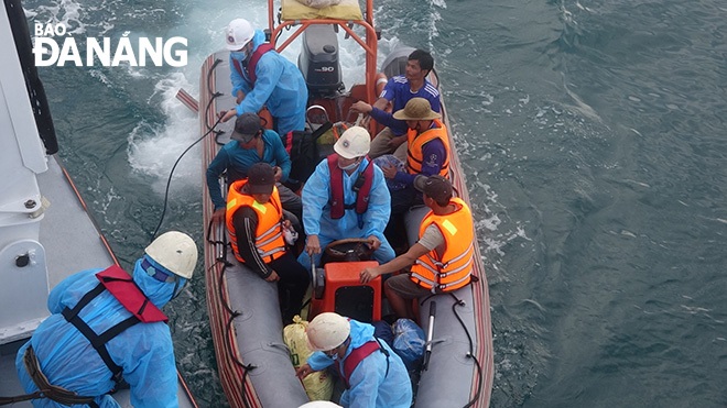 Distressed fishermen were being transferred to the rescue ship