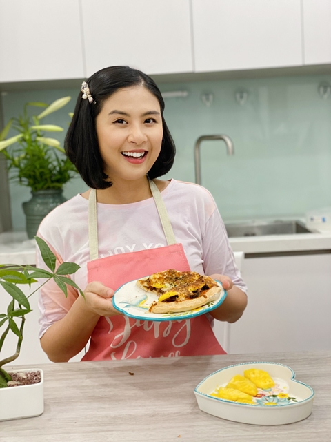 Ngoc Han and the pizza made from Vietnamese northern specialities.