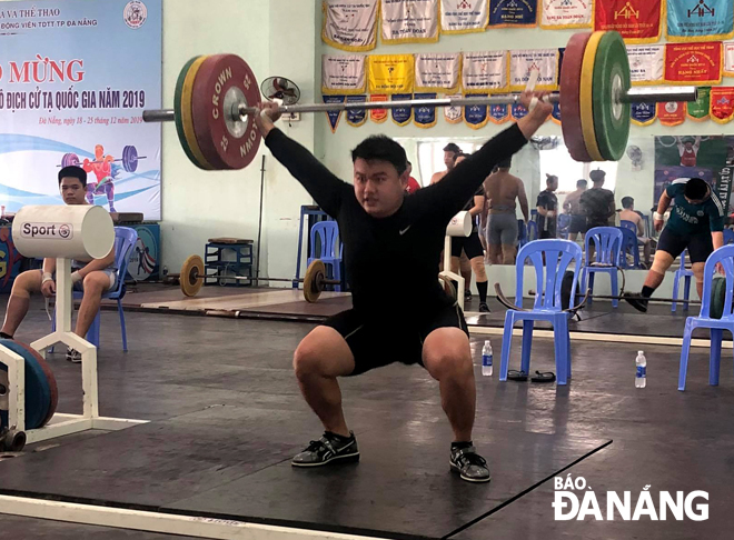 Local young weightlifter Nguyen Van Duc 