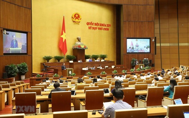 At a meeting of the ninth session of the 14th National Assembly (Photo: VNA)