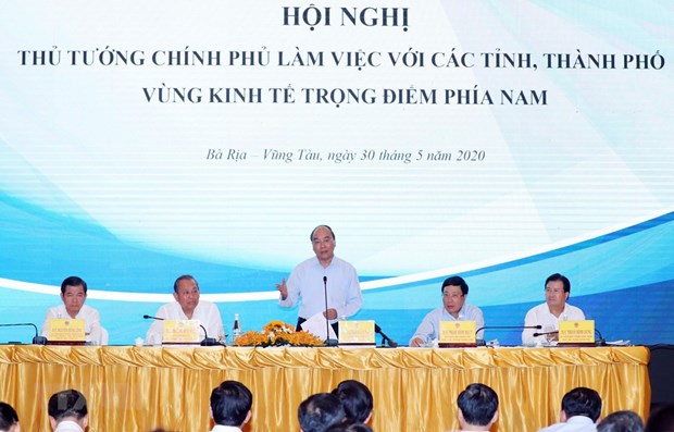 Thủ tướng Chính phủ Nguyễn Xuân Phúc chủ trì buổi làm việc của Thường trực Chính phủ với lãnh đạo các tỉnh, thành phố Vùng kinh tế trọng điểm phía Nam. (Ảnh: Thống Nhất/TTXVN)