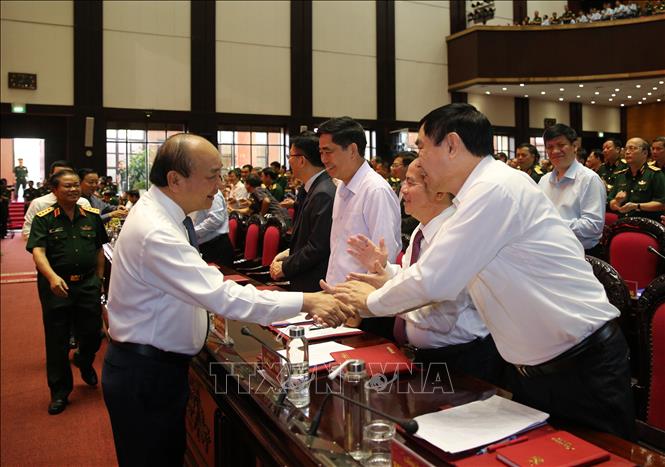 Thủ tướng Nguyễn Xuân Phúc với các đại biểu dự hội nghị. Ảnh: Dương Giang-TTXVN