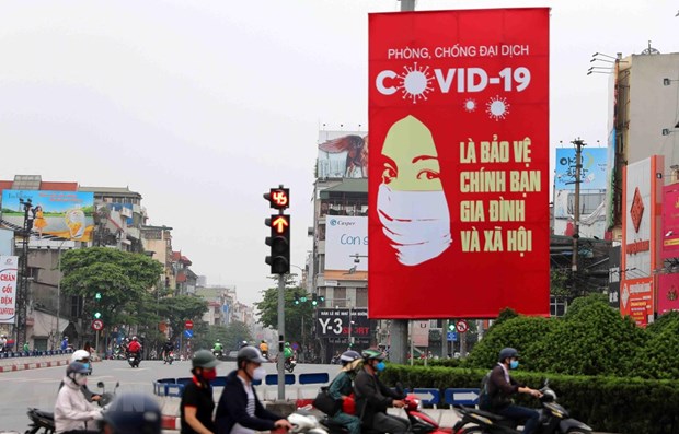 A poster on Hanoi street (Photo: VNA)