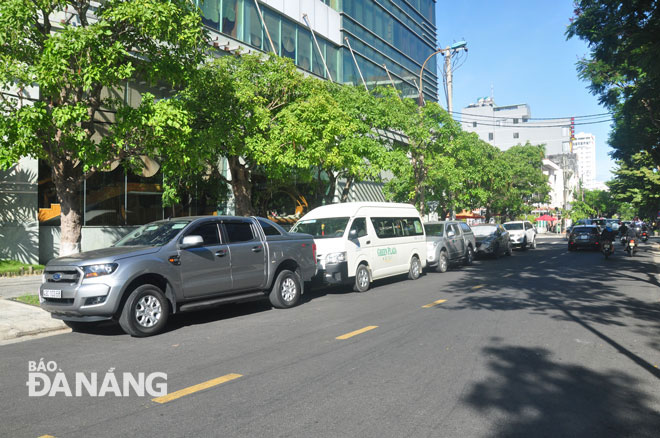 4-wheeled vehicles parking along a local street