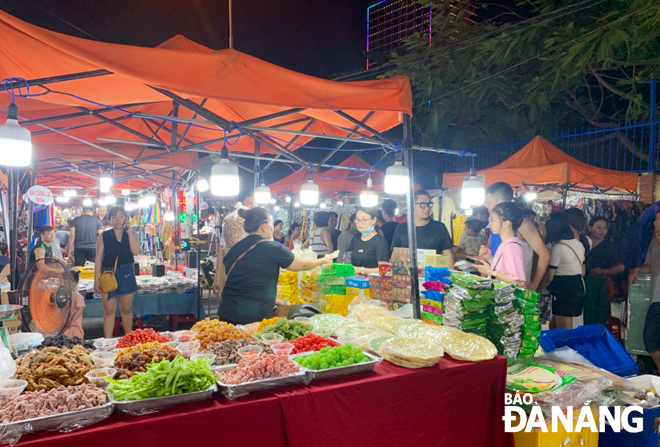 The bustling ambiance recorded at the  Son Tra Night Market