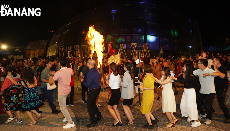 Tourists immersing themselves in the joyful ambiance at the Sun World Ba Na Hills Resort