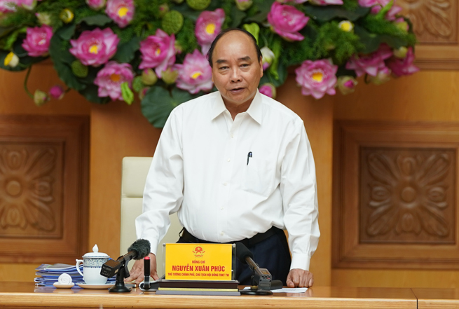 Thủ tướng nguyễn Xuân Phúc phát biểu tại cuộc họp. Ảnh: VGP/Quang Hiếu