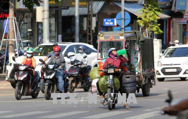  Dự báo thời tiết nắng nóng tại Bắc Bộ sẽ giảm bớt trong vài ngày tới. Ảnh: TTXVN.