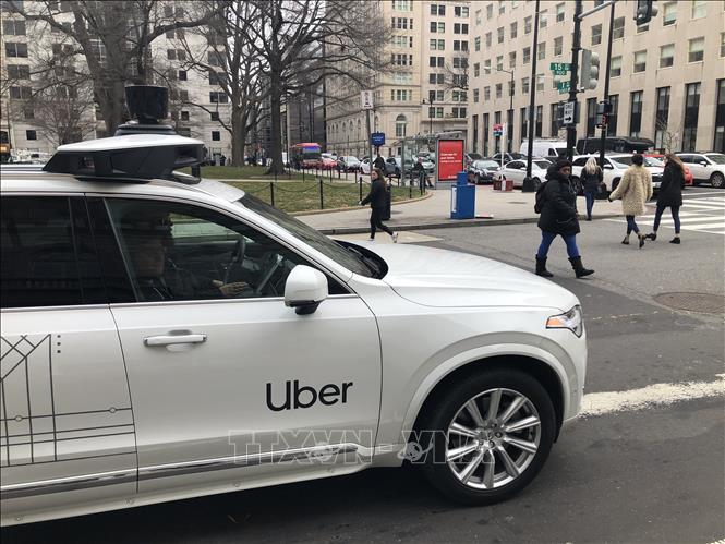 Xe của Uber trên các đường phố ở Washington, DC, Mỹ. Ảnh: AFP/TTXVN