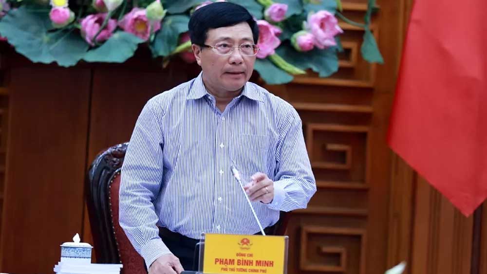 Deputy Prime Minister and Foreign Minister Pham Binh Minh speaking at the meeting. (Photo: VGP)