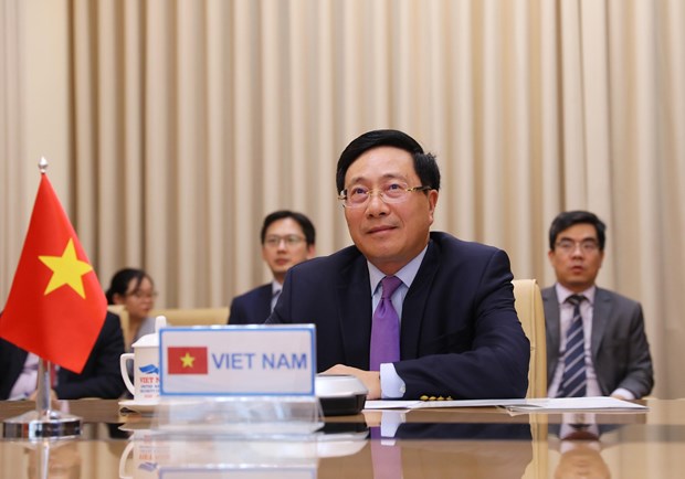 Deputy Prime Minister and Foreign Minister Pham Binh Minh at the teleconferenced high-level open debate on July 24 (Photo: VNA)