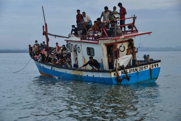 A boat carrying Rohingya people from Myanmar arrives on the shorelines of Lancok village, in Indonesia's North Aceh Regency on June 25, 2020. (Photo: AFP)