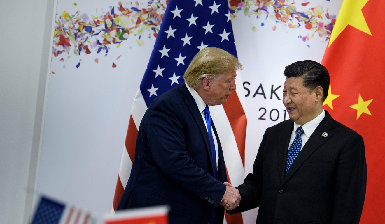 Tổng thống Mỹ Donald Trump (phải) và Chủ tịch Trung Quốc Tập Cận Bình gặp bên lề ở Hội nghị thượng đỉnh G-20 ở Osaka, tháng 6/2019. Ảnh: AFP