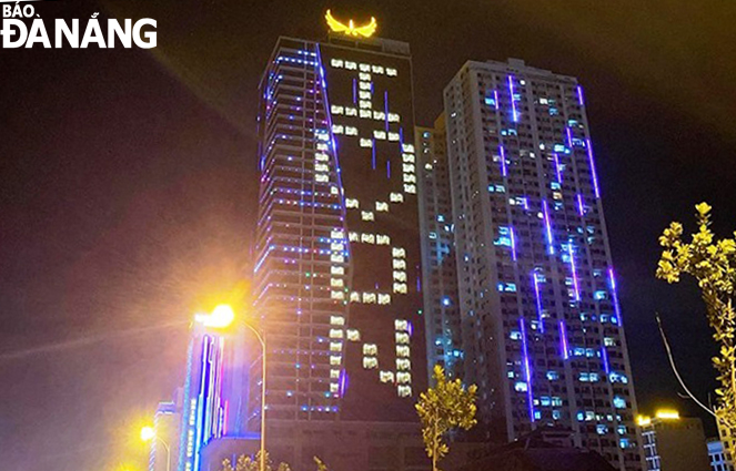 The Muong Thanh Luxury Danang Hotel lights up its rooms to form the word “I LOVE DN” every night