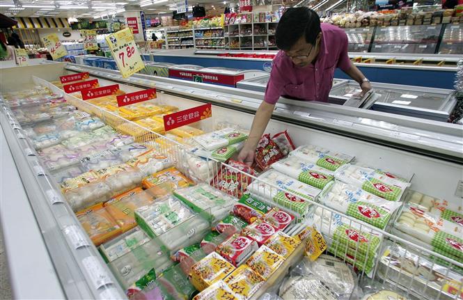 Thực phẩm đông lạnh được bày bán tại siêu thị ở Bắc Kinh, Trung Quốc. Ảnh: AFP/ TTXVN