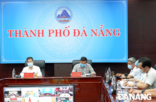  Da Nang Party Committee Deputy Secretary Nguyen Van Quang and municipal People's Committee People's Committee Vice Chairman Le Trung Chinh being among the event’s participants in Da Nang
