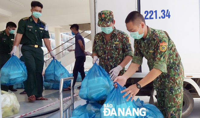 Local border guards delivering food to the quarantined people