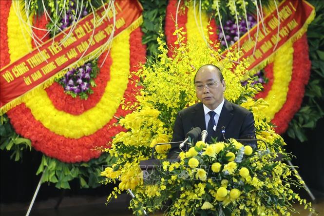 Thủ tướng Nguyễn Xuân Phúc đọc điếu văn tiễn biệt nguyên Tổng Bí thư Lê Khả Phiêu. Ảnh: Dương Giang/TTXVN