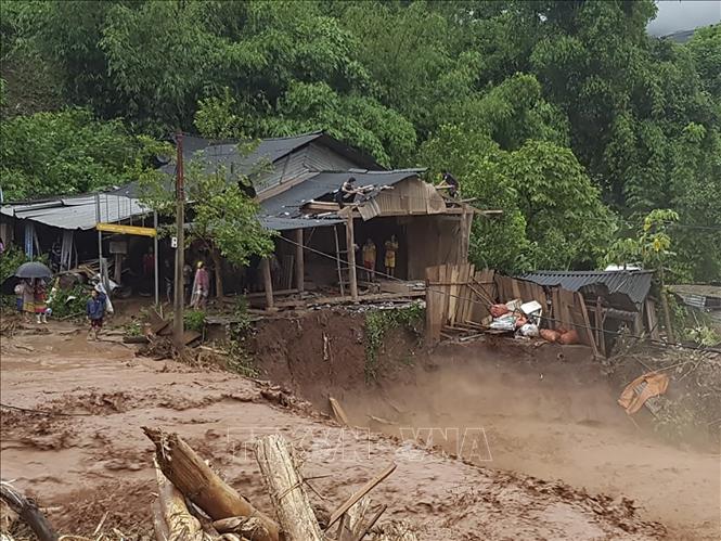 Lũ cuốn trôi nhà dân ở bản Nậm Nhừ 1, xã Nậm Nhừ, huyện Nậm Pồ. Ảnh: Xuân Tư/TTXVN