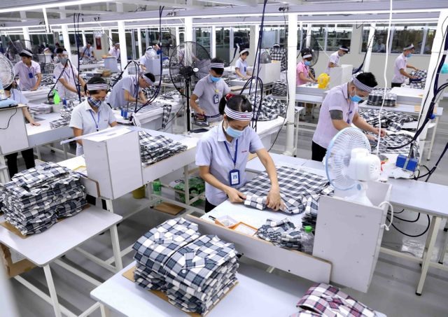 Shirt production line at KH Vina Co Ltd. The Ministry of Planning and Investment (MPI) will look to extend some economic stimulus policies until 2021 if the COVID-19 pandemic continues