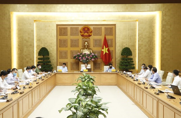 Deputy Prime Minister Vuc Duc Dam chairs the meeting. (Photo: VNA)