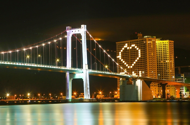 Hotels light up in the central city of Đà Nẵng. A photo and painting contest on the fight against COVID-19 will go online. VNS Photo Lê Lâm