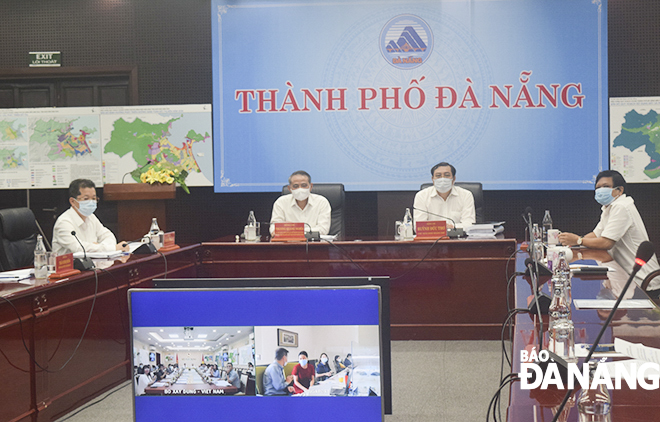 The Da Nang leaders participating in the Wednesday webinar on appraising the adjustments to Da Nang’s master plan on socio-economic development by 2030, with a vision towards 2045.