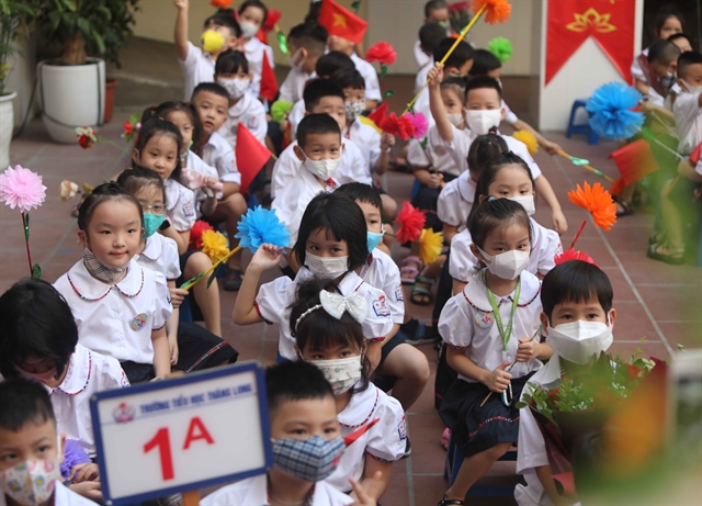 First grade students at Thăng Long Primary School in Hà Nội’s Hoàn Kiếm District attend the opening ceremony for the new school year. — VNA/VNS Photo Thanh Tùng