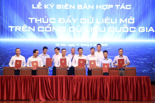 State agencies and organisations pledged to share data on the National Data Portal at the launch ceremony of the portal on August 31 in Hà Nội. — VNA/VNS Photo Minh Quyết