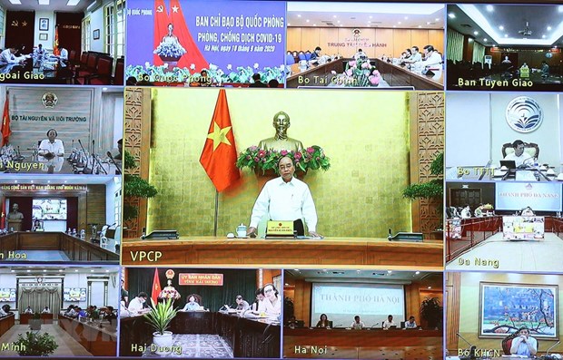 Prime Minister Nguyen Xuan Phuc speaks at the meeting (Photo: VNA)