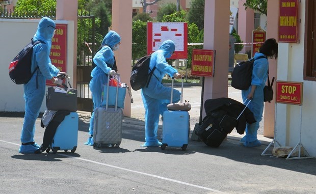 Vietnamese citizens returning from abroad go to concentrated quarantine facility (Source: VNA)