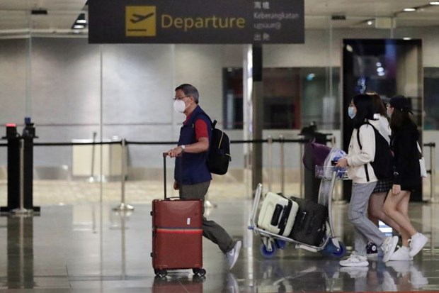 Passengers at Changi airport (Source: straitstimes.com)